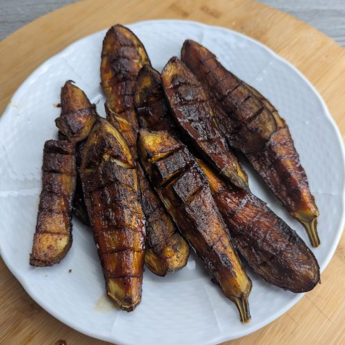 Smoky, sticky Charred Eggplant Ribs glazed with tangy pomegranate BBQ sauce. A modern vegetarian BBQ recipe that’s easy, glossy, and full of Mediterranean flavor.